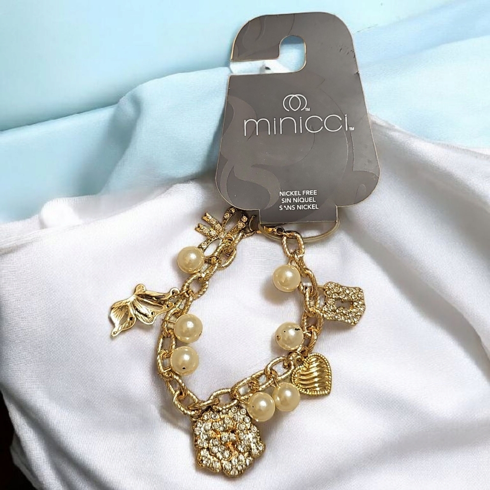 Minicci Gold and Cream Charm Bracelet